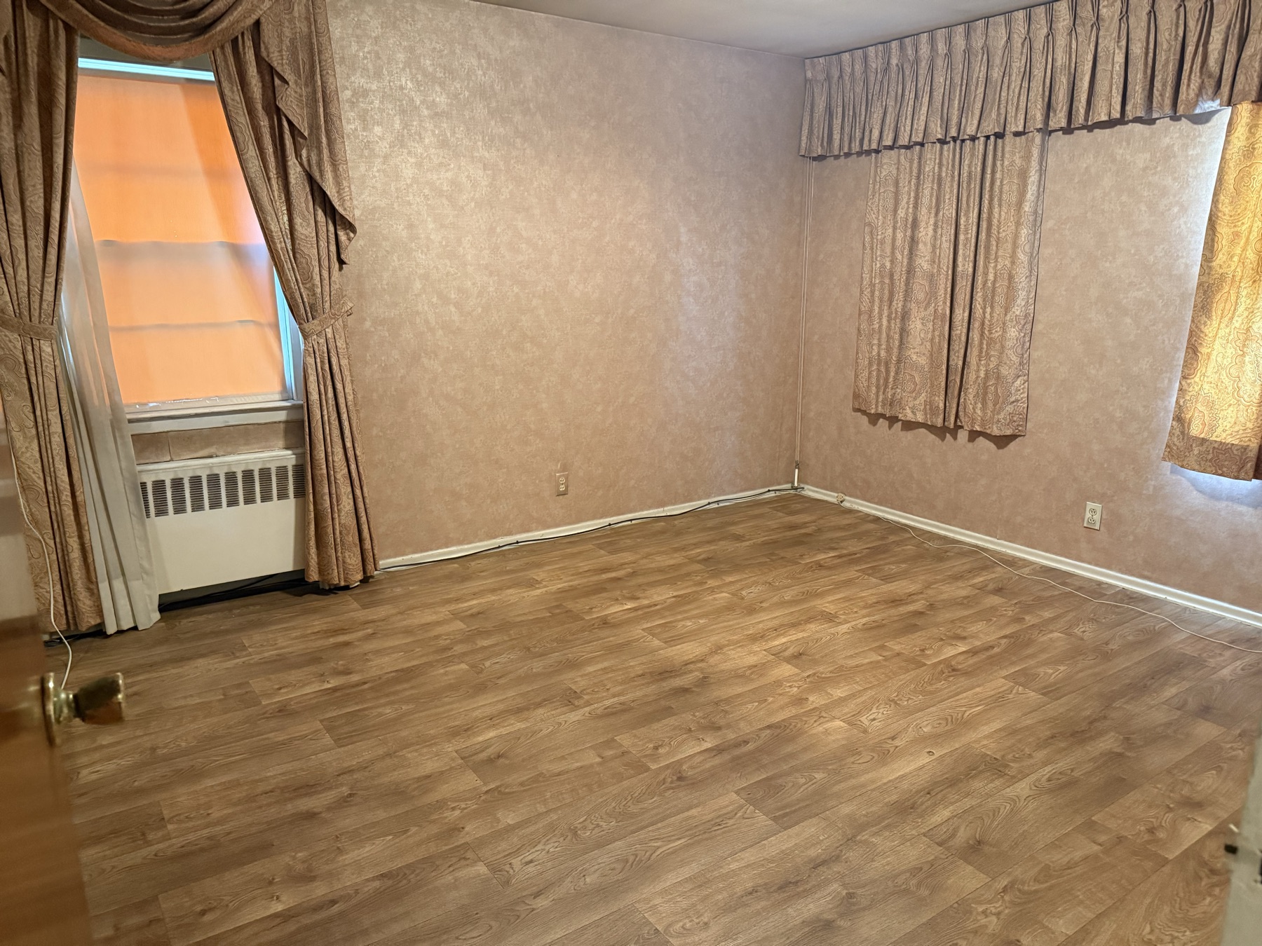 Clean bedroom floor after pre-listing home cleaning in New York City