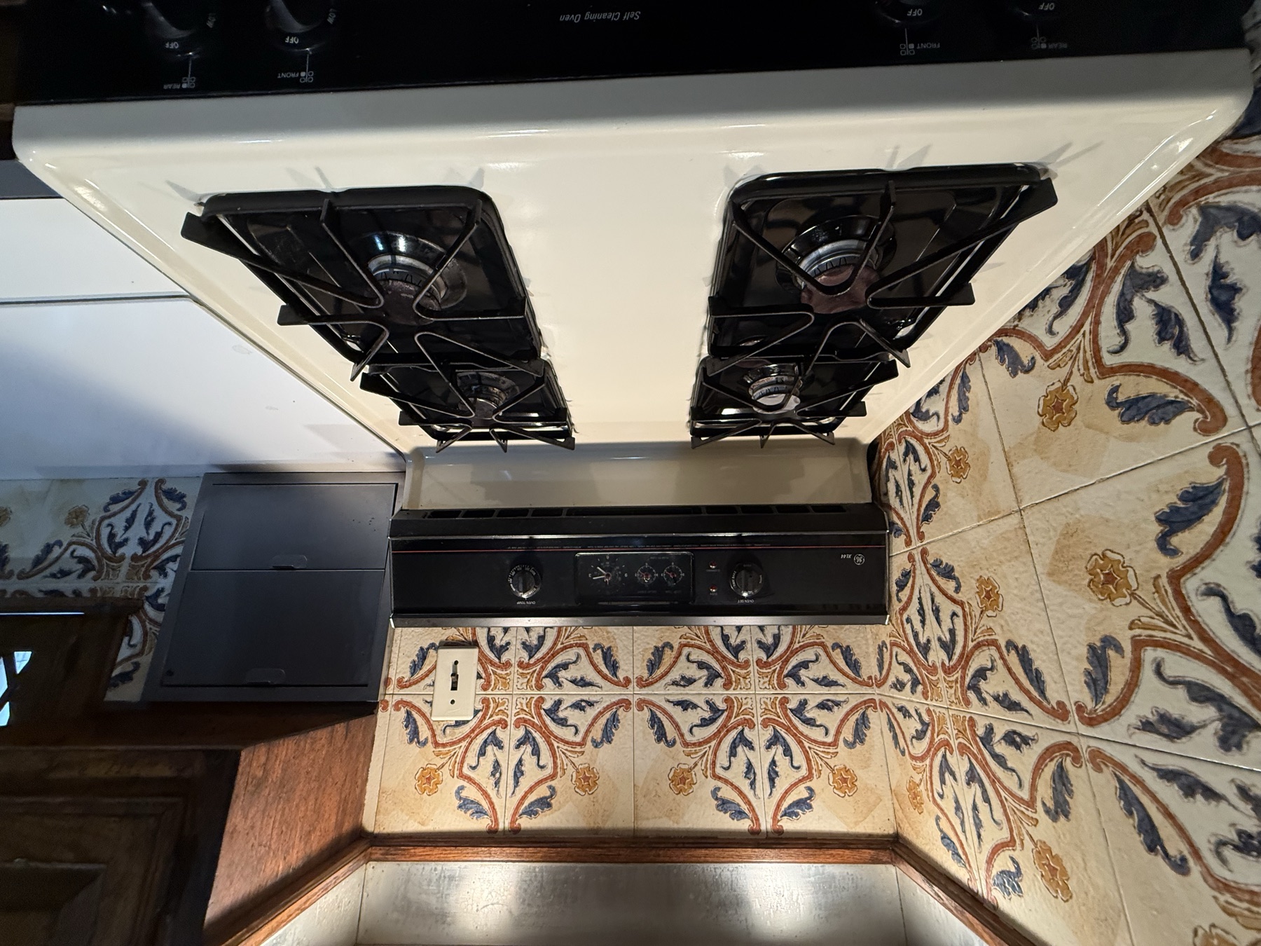 Clean stovetop after pre-listing kitchen cleaning in New York City