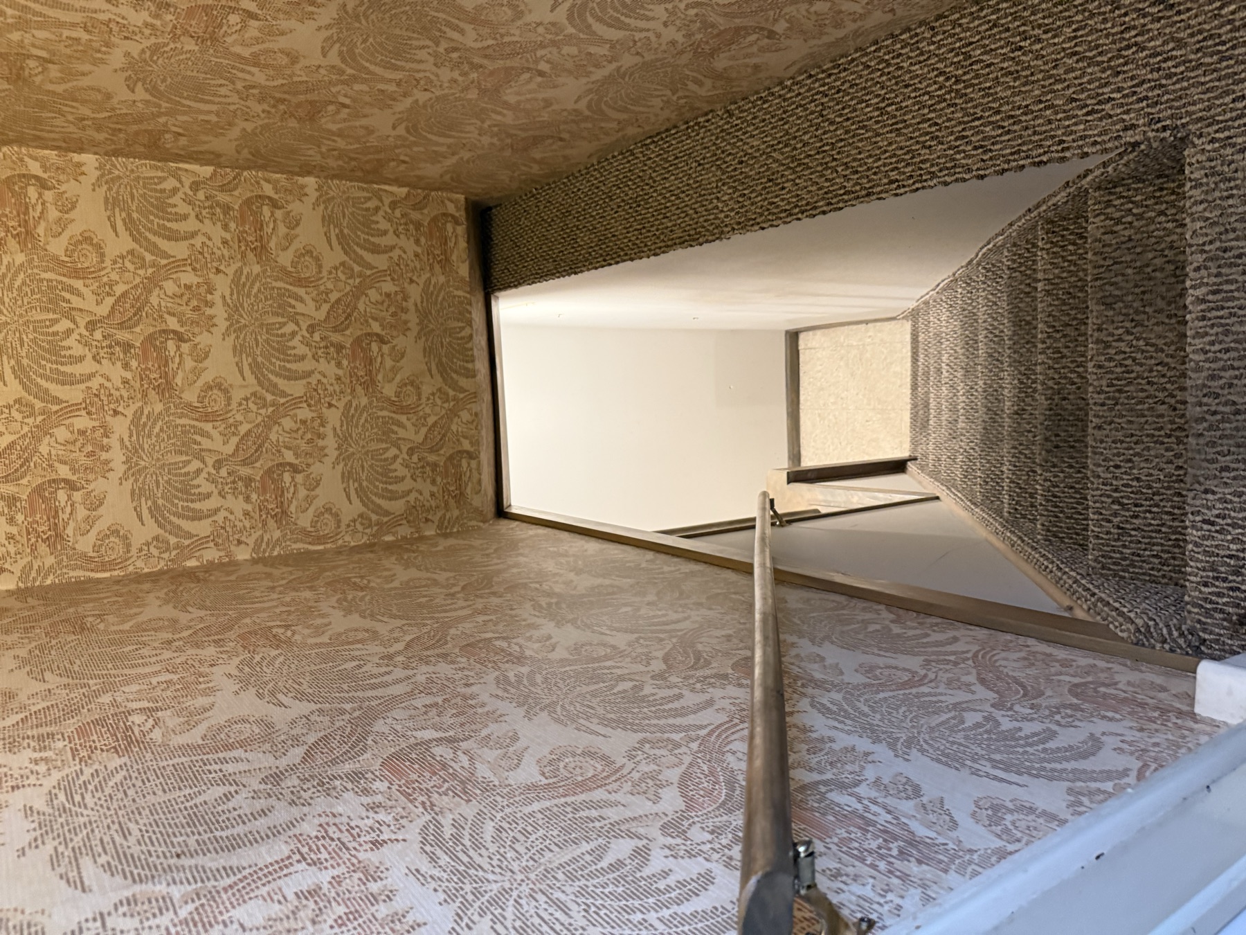 Clean carpeted staircase after final home cleaning before sale
