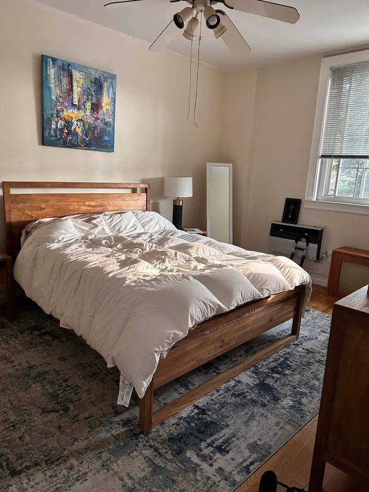 Freshly cleaned bedroom in a Jamaica, Queens home