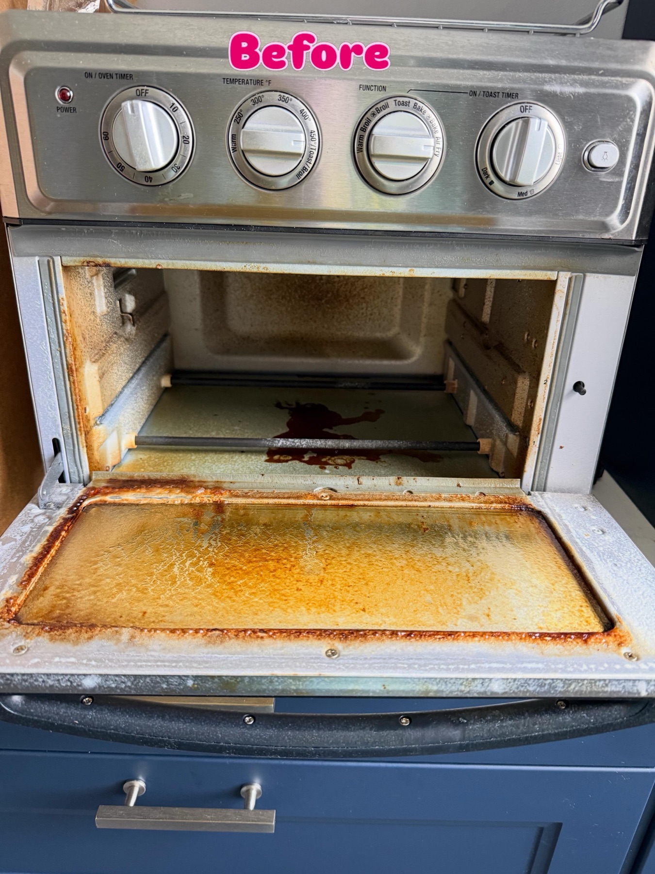 Oven with heavy baked-on grease before move-in cleaning in New York City