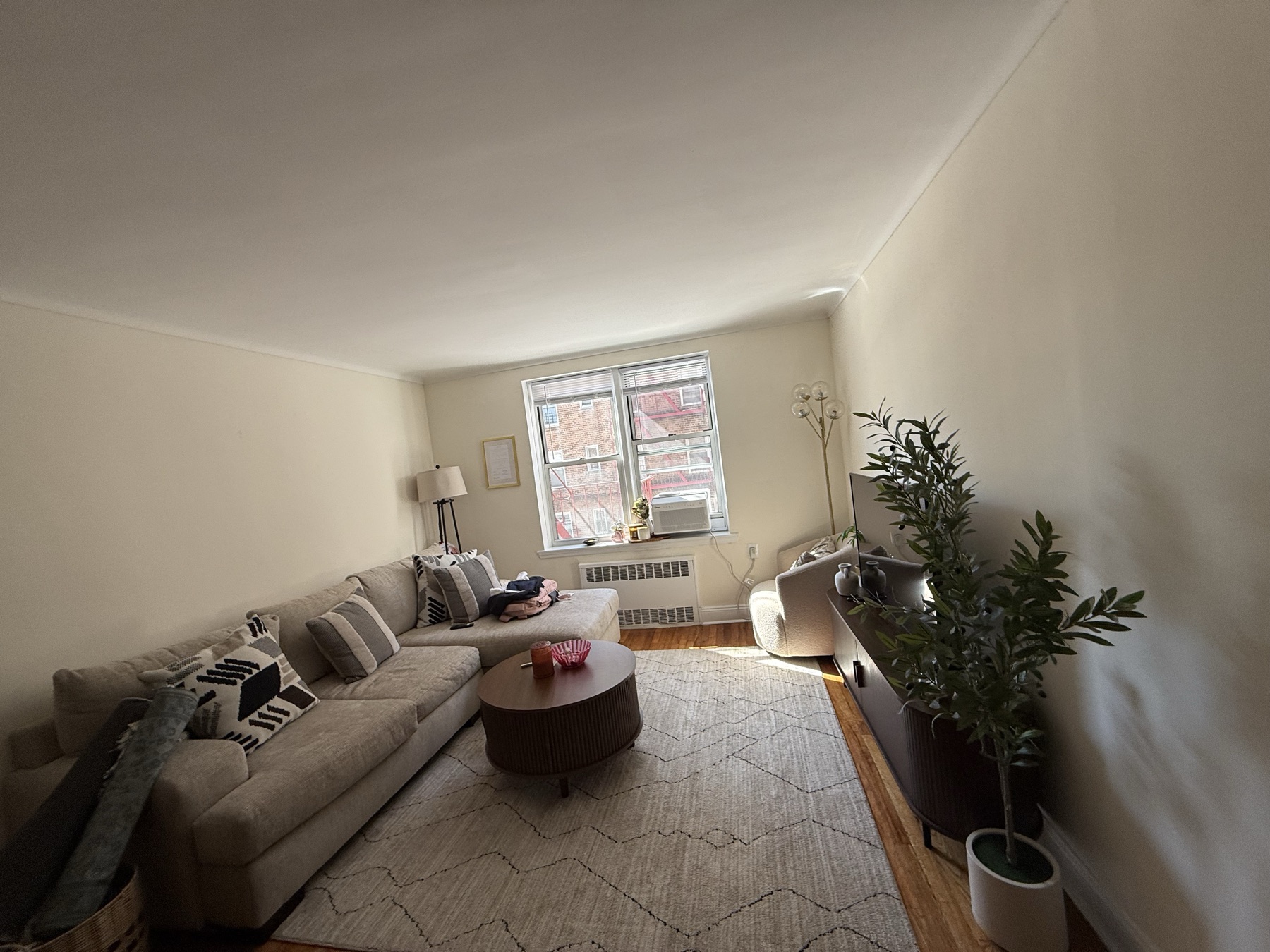 Clean furnished living room after move-in apartment cleaning in New York City