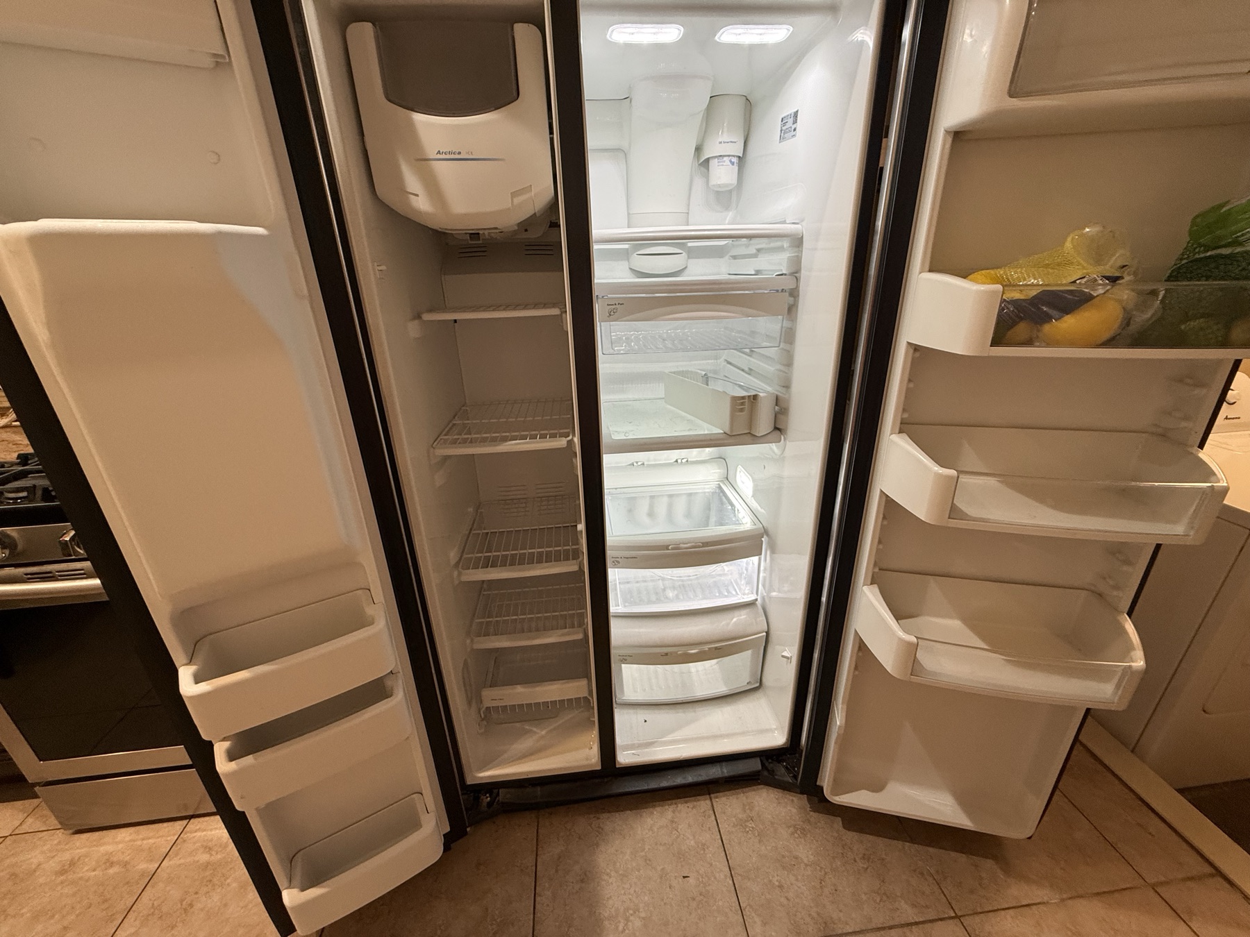 Clean refrigerator interior after pre-listing home cleaning in New York City