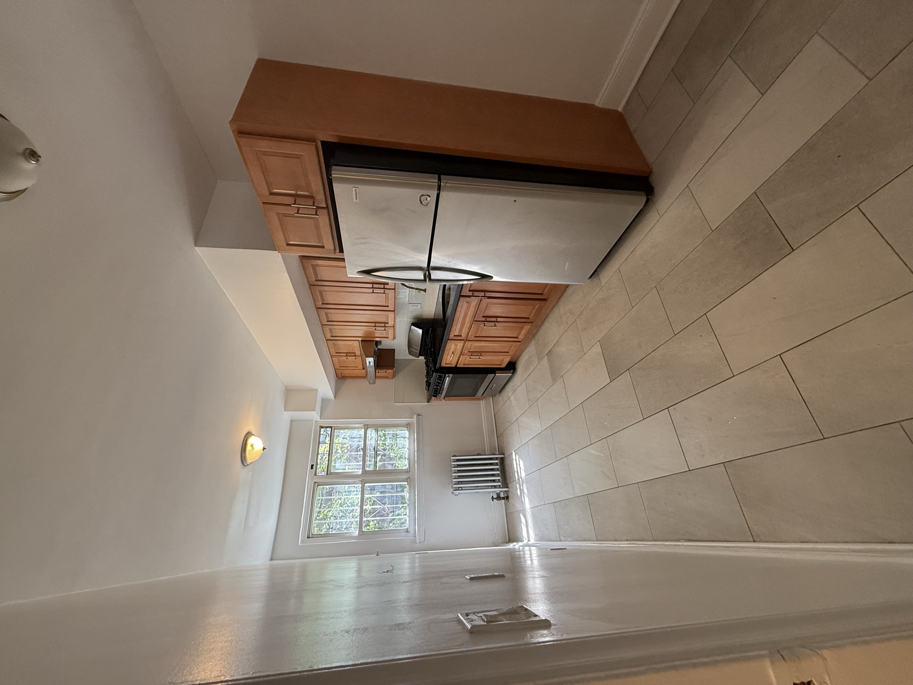 Clean kitchen after move-in apartment cleaning for a newly married couple in Queens, New York