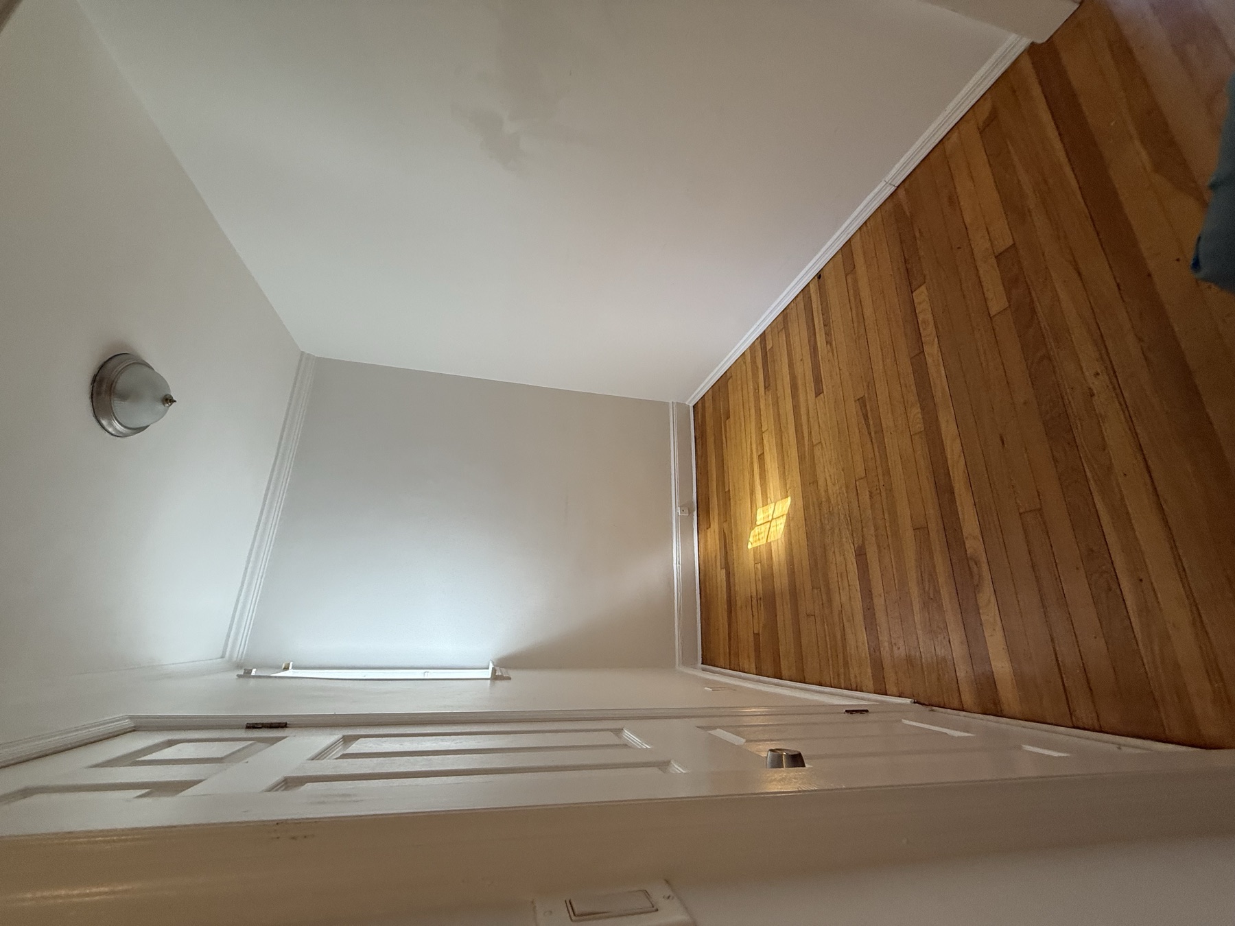 Clean additional room and hardwood floor after Queens move-in cleaning